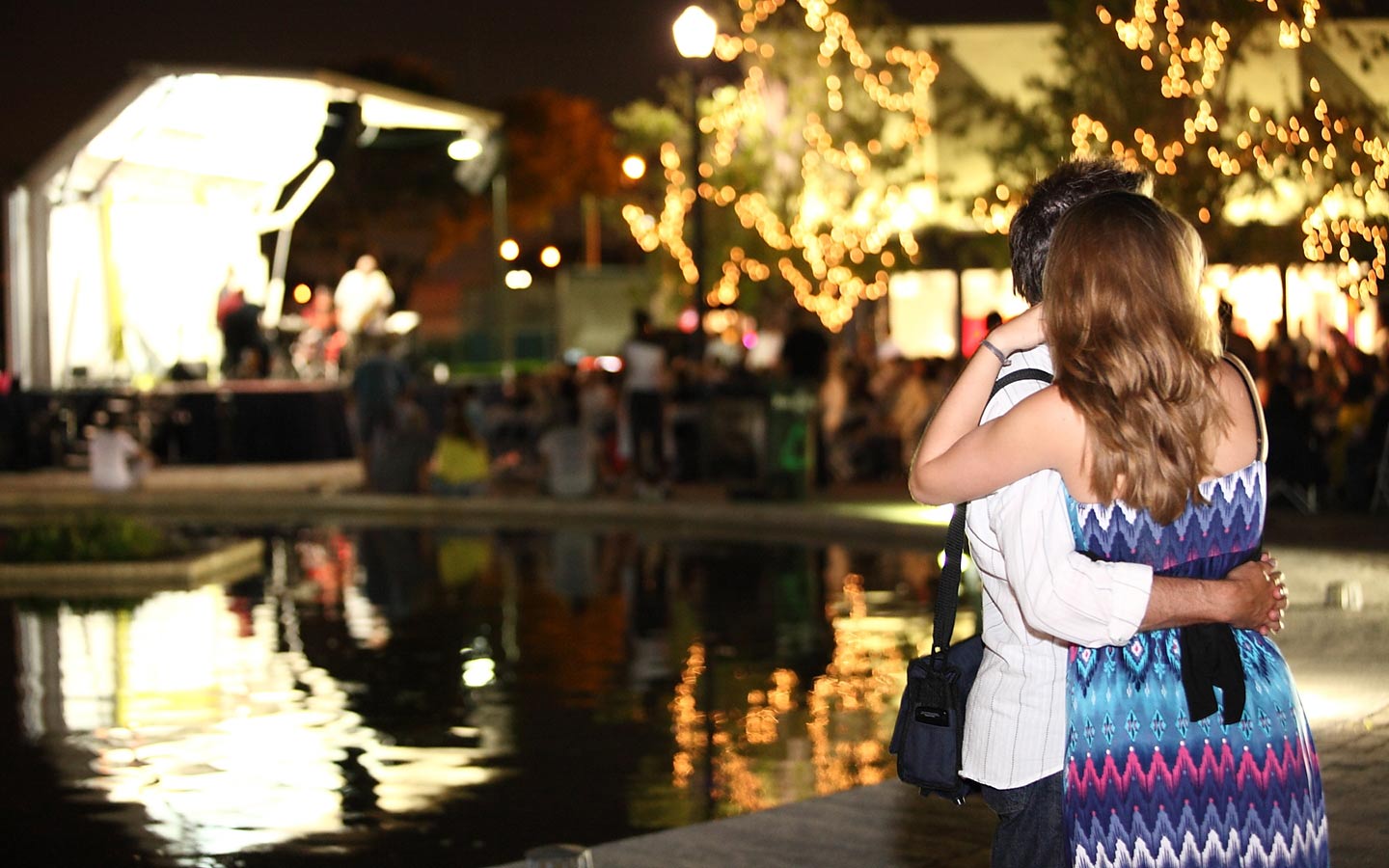 Couple watching a Jazz at MOCA outdoor performance