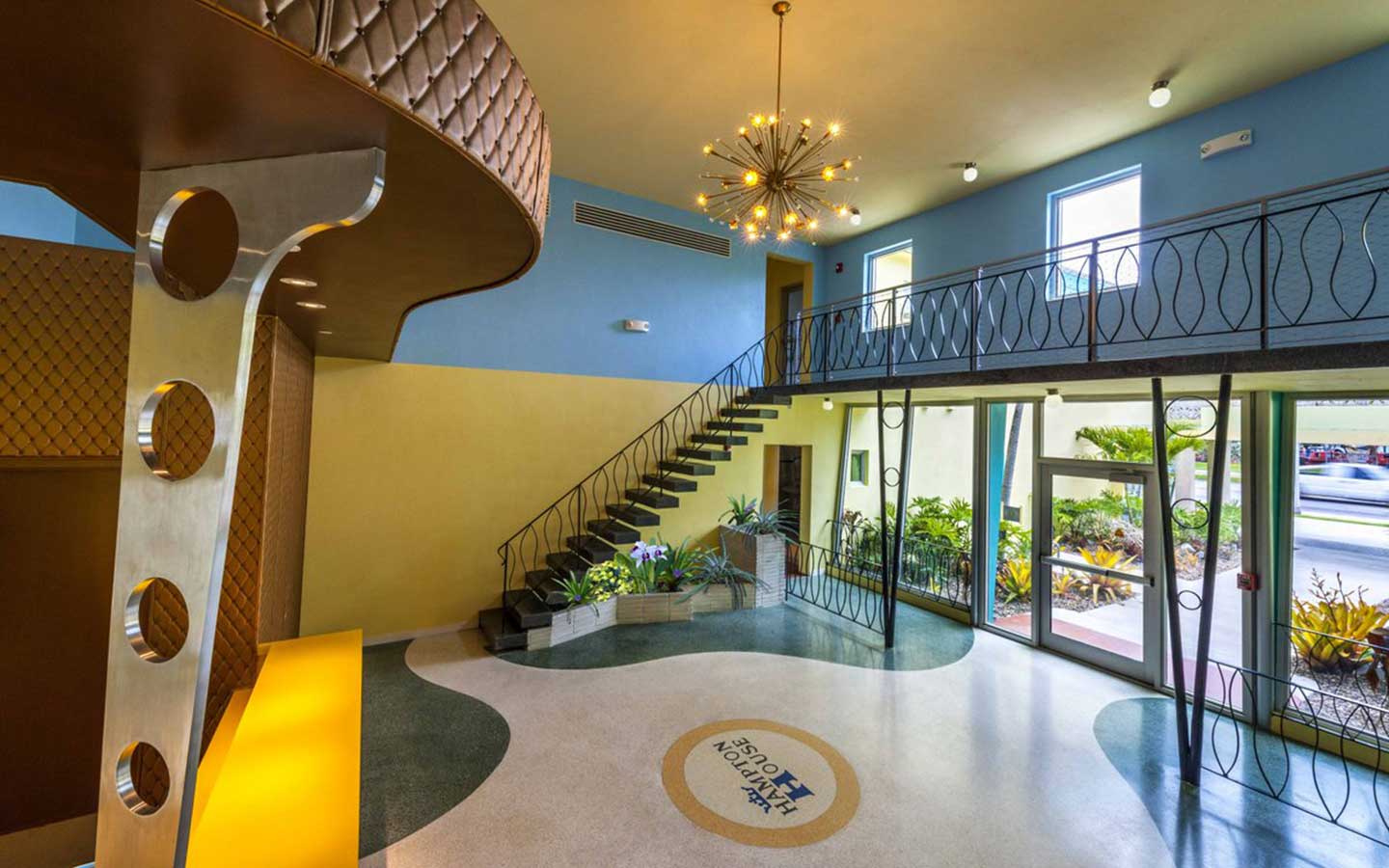 Blue and yellow lobby of the Historic Hampton House