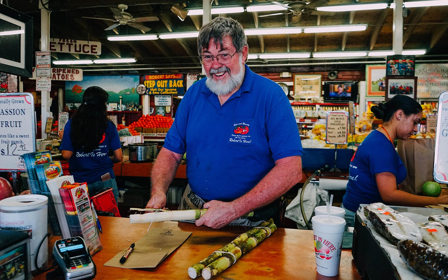 Robert preparing sugarcane at Robert is Here